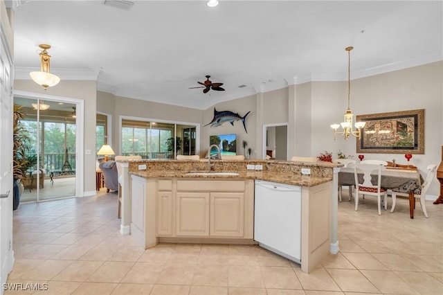 kitchen featuring a kitchen island with sink, dishwasher, pendant lighting, and sink