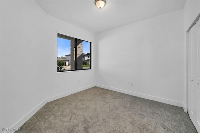 view of carpeted spare room