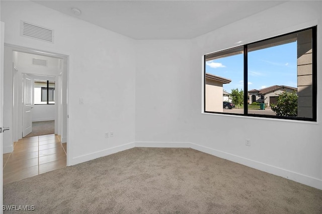 view of carpeted spare room