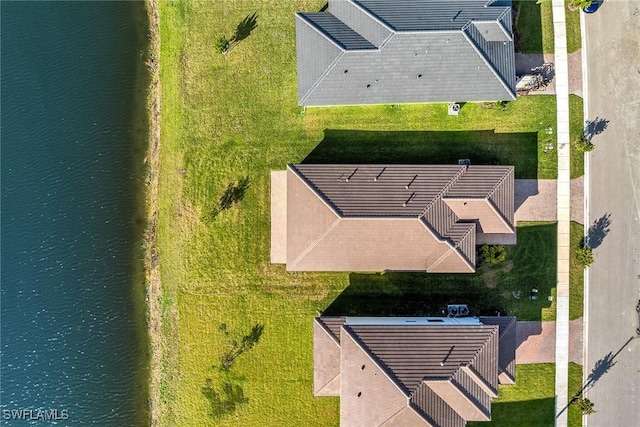 drone / aerial view featuring a water view