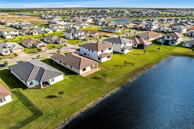 drone / aerial view featuring a water view