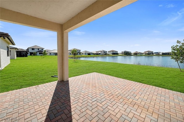 view of patio / terrace featuring a water view