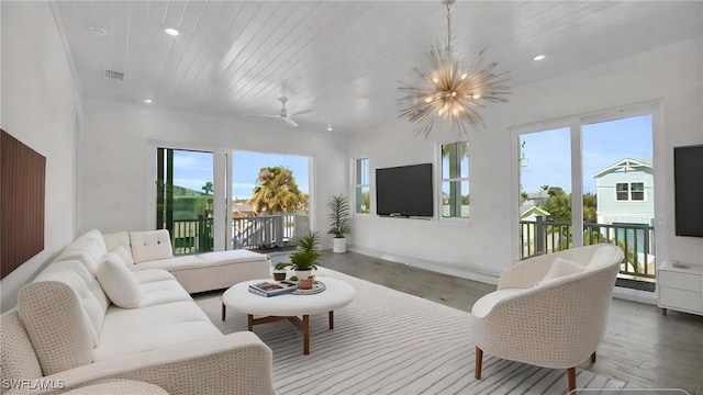 living room featuring wooden ceiling, hardwood / wood-style floors, an inviting chandelier, and a healthy amount of sunlight