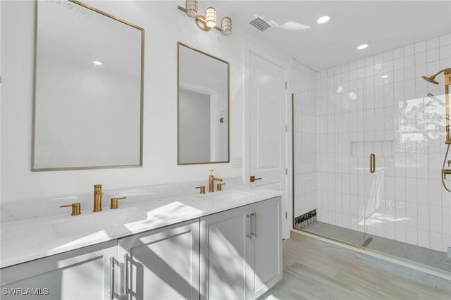 3190 Shell Mound Blvd, Fort Myers Beach, FL 33931 - bathroom with a sink, double vanity, a stall shower, and recessed lighting