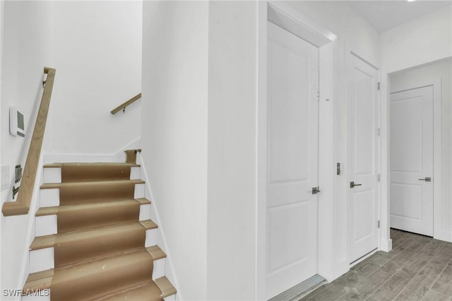 3190 Shell Mound Blvd, Fort Myers Beach, FL 33931 - staircase with wood finished floors
