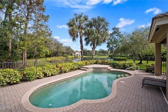 view of pool featuring a patio