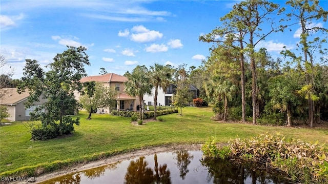 view of yard featuring a water view