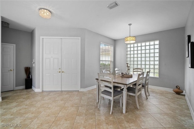 dining room featuring light tile patterned flooring