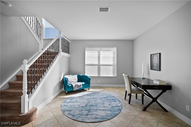 living area with light tile patterned flooring