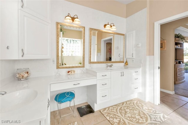 bathroom with vanity and tile patterned floors