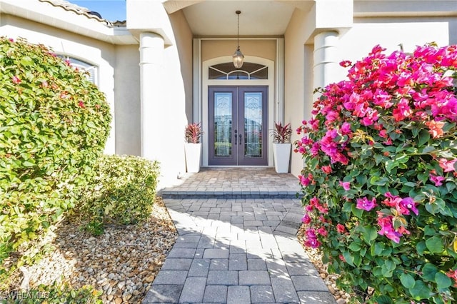 doorway to property featuring french doors