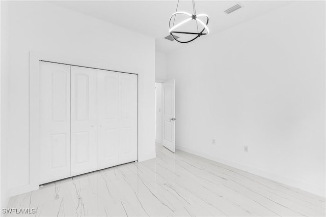 unfurnished bedroom with a closet