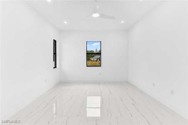 empty room featuring ceiling fan