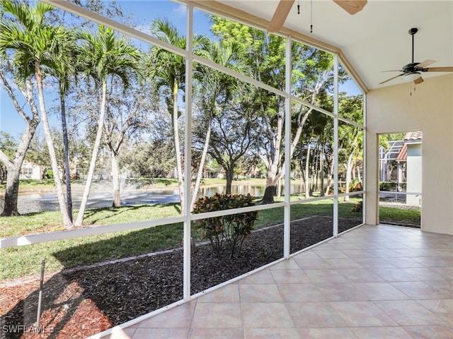 unfurnished sunroom featuring vaulted ceiling