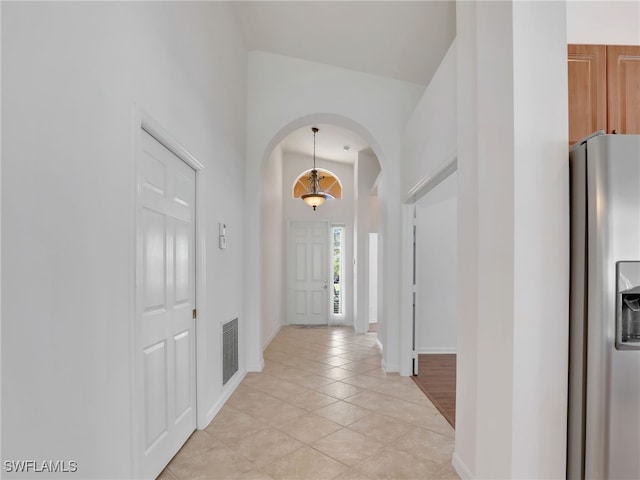 entrance foyer with light tile patterned flooring