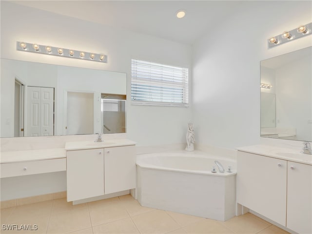 bathroom with tile patterned flooring, vanity, and independent shower and bath