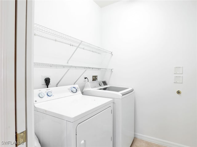 laundry room with washer and dryer