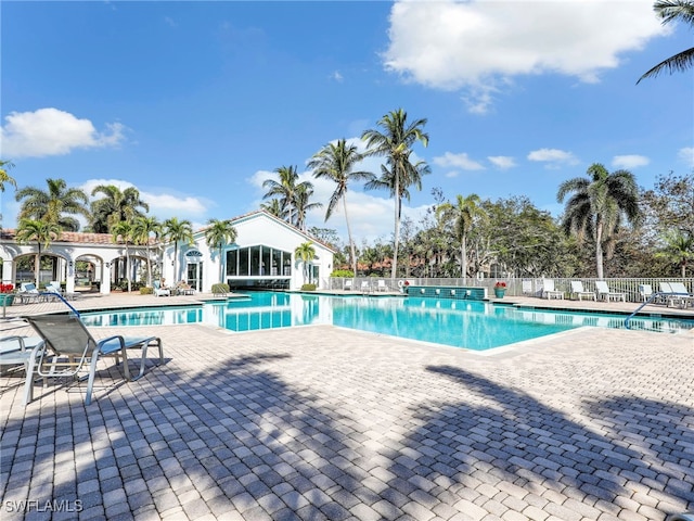 view of swimming pool featuring a patio