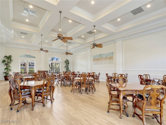 dining space featuring french doors, coffered ceiling, crown molding, beamed ceiling, and light hardwood / wood-style floors