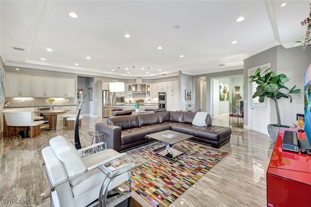 living room featuring ornamental molding