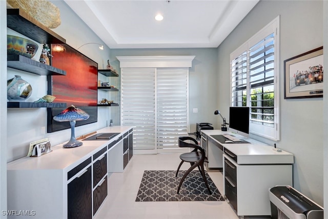 home office with a tray ceiling