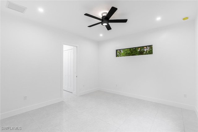 spare room featuring ceiling fan