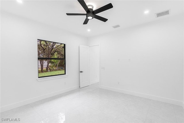 spare room featuring ceiling fan