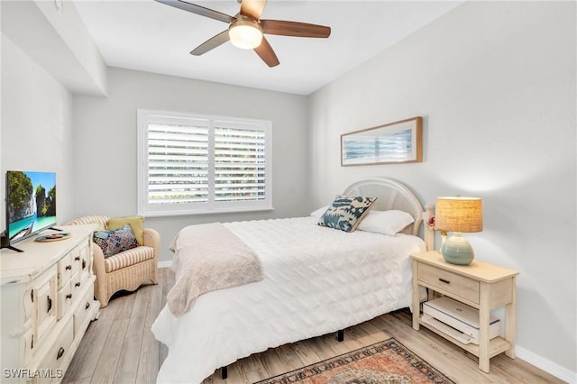 bedroom featuring ceiling fan and light wood-type flooring