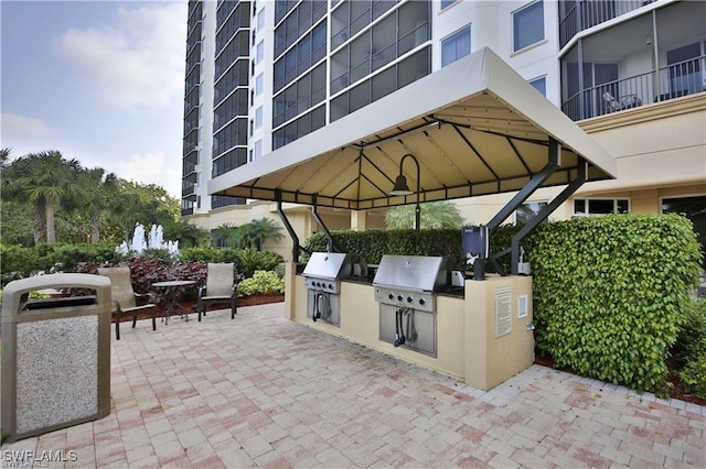 1065 Borghese Ln Unit 701, Naples, FL 34114 - view of patio / terrace featuring a gazebo
