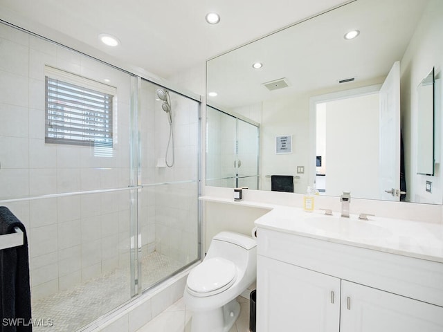 1065 Borghese Ln Unit 701, Naples, FL 34114 - full bath with vanity, recessed lighting, toilet, and a stall shower