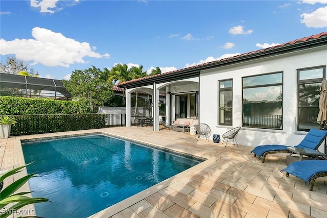 view of pool with a patio and a fenced in pool