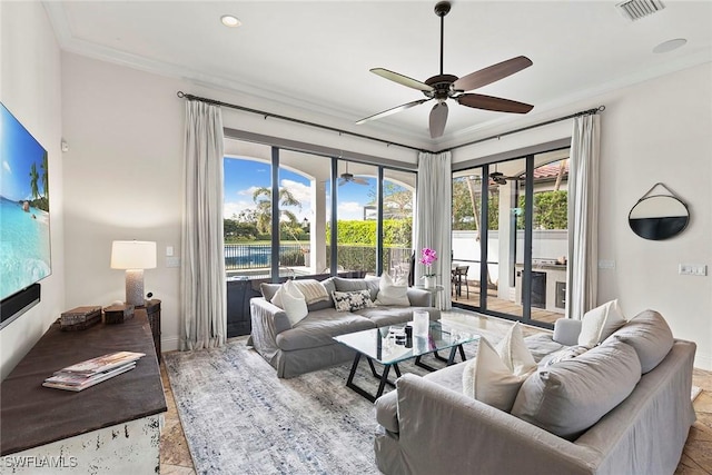 living room featuring recessed lighting, visible vents, ornamental molding, a ceiling fan, and baseboards