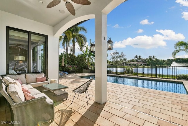 view of pool with a fenced in pool, a ceiling fan, a patio, a fenced backyard, and outdoor lounge area