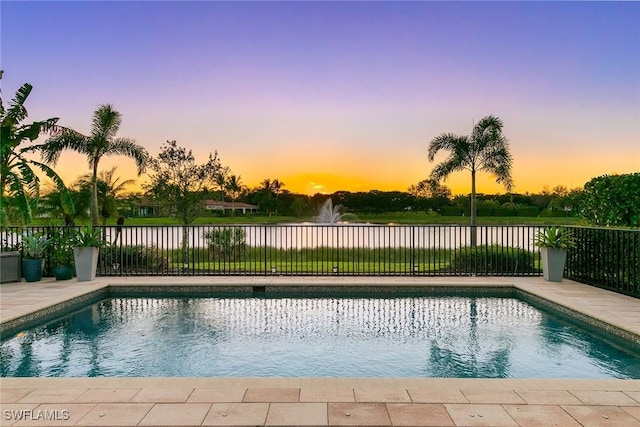 view of swimming pool featuring a fenced in pool and fence