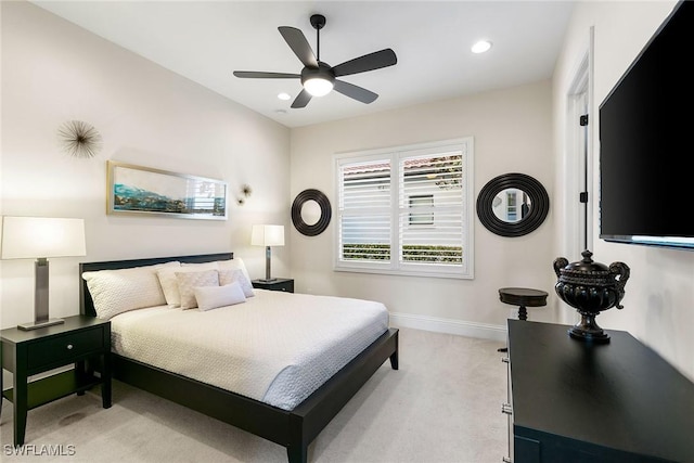 bedroom with recessed lighting, baseboards, ceiling fan, and light colored carpet