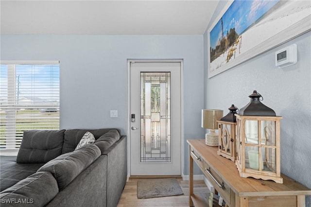 foyer with light hardwood / wood-style flooring