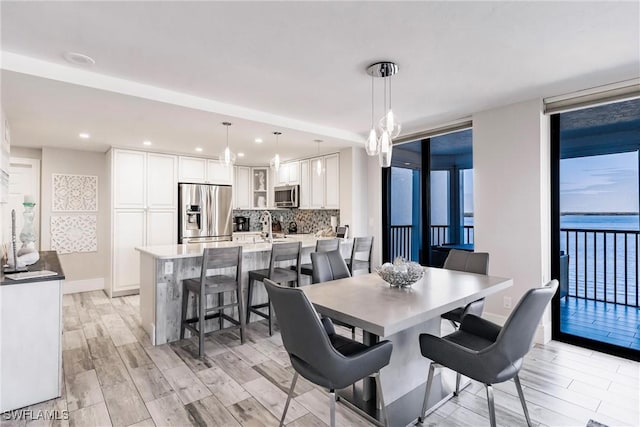 dining area with a water view