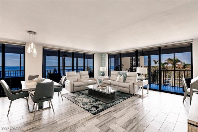 living room with floor to ceiling windows