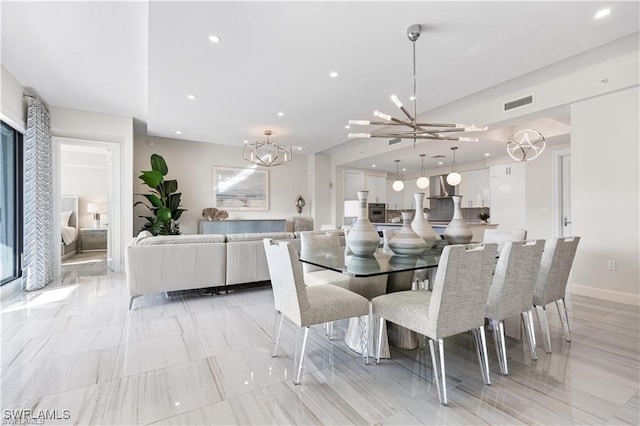 dining space with a chandelier