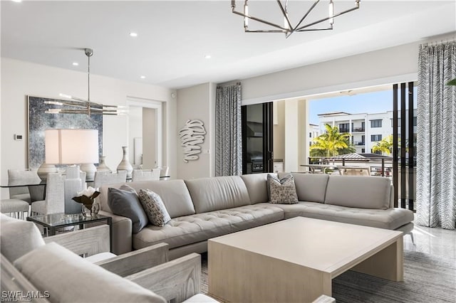 living room featuring an inviting chandelier