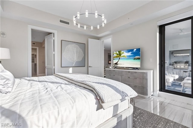 bedroom featuring a raised ceiling