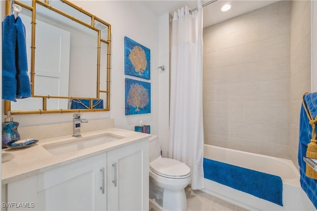 full bathroom with vanity, shower / bath combination with curtain, and toilet