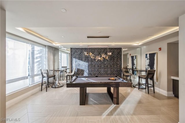 rec room featuring a tray ceiling and pool table