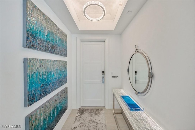 doorway to outside featuring light tile patterned floors