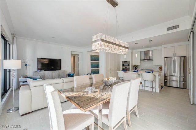 dining space with a chandelier