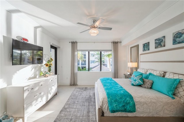 bedroom featuring ceiling fan and crown molding