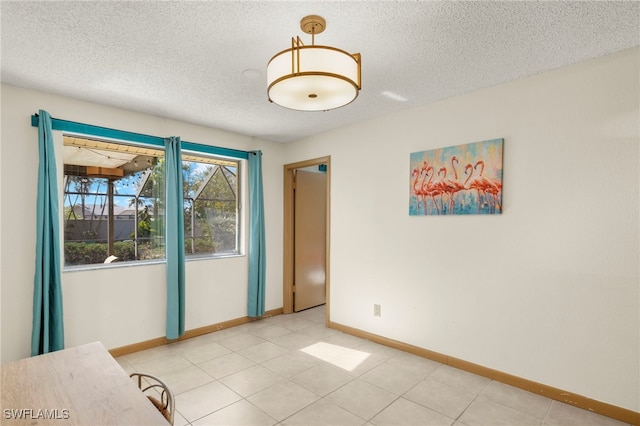 interior space with a textured ceiling