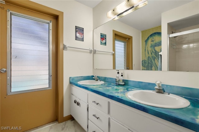 bathroom with a shower and vanity