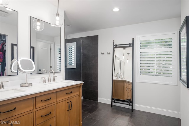 bathroom featuring tile patterned floors and vanity