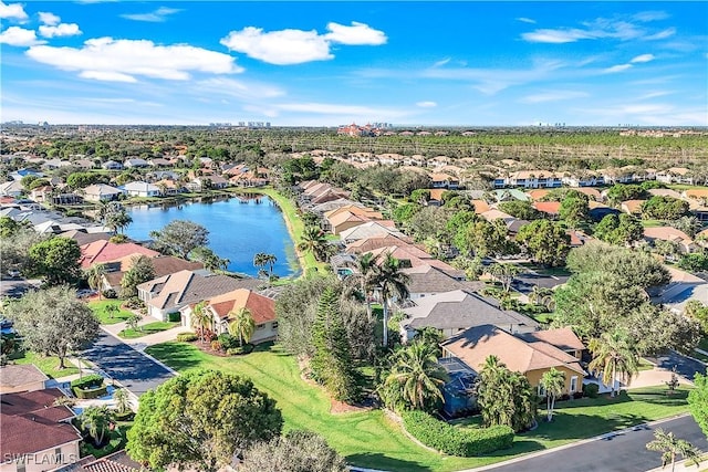 aerial view featuring a water view and a residential view